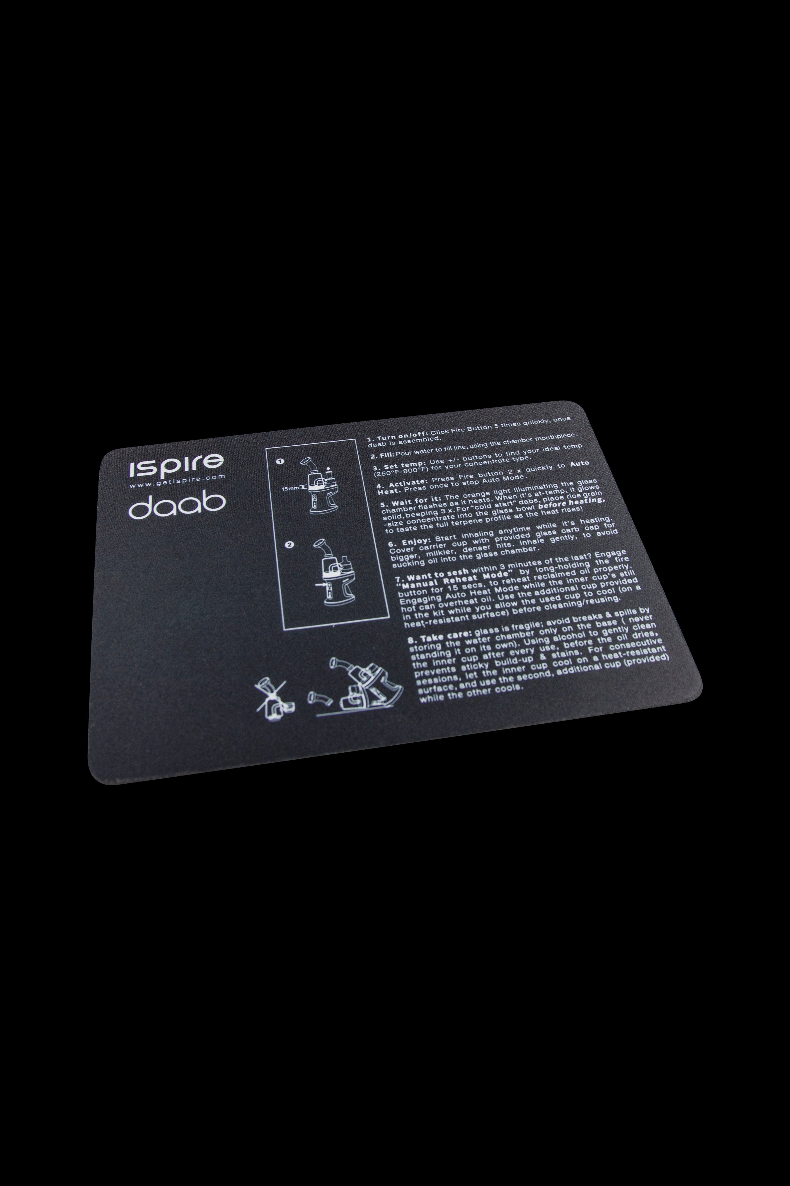 Close-up of a Daab cannabis oil vaporizer instruction manual with diagrams and text on a black background.