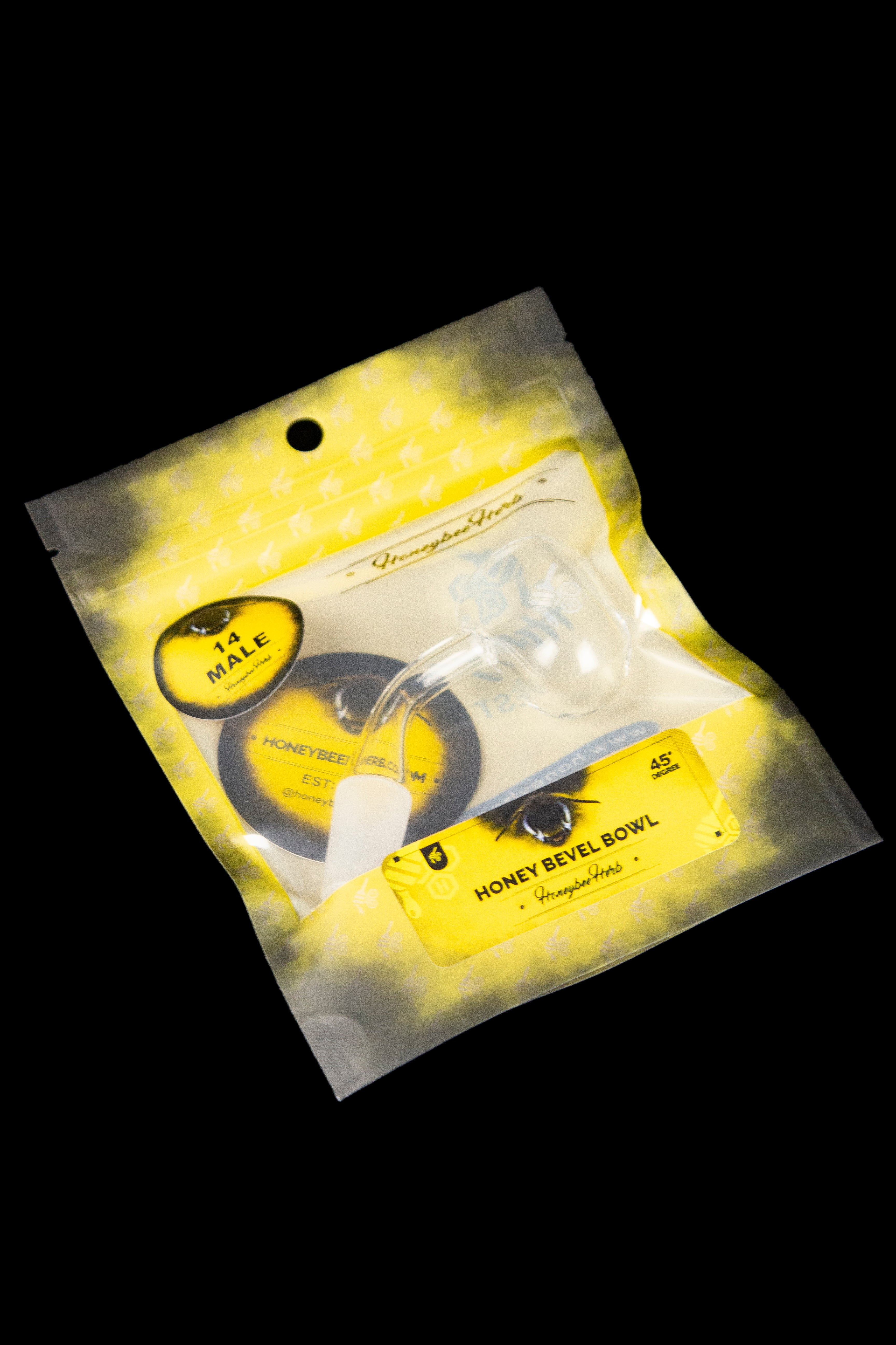 Yellow plastic bag containing two cannabis bowls labeled "Honey Bee Bowl" and "14k."