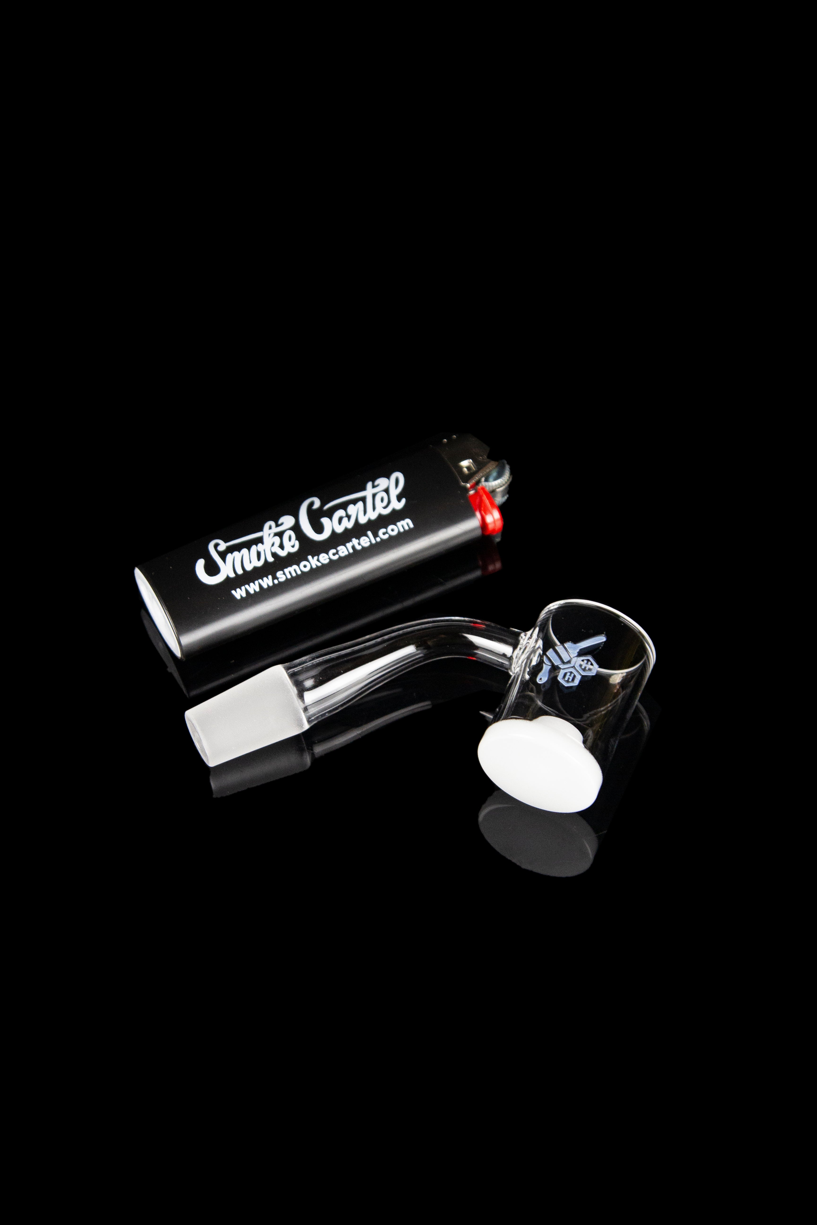 Cannabis oil rig with glass carb cap and case.