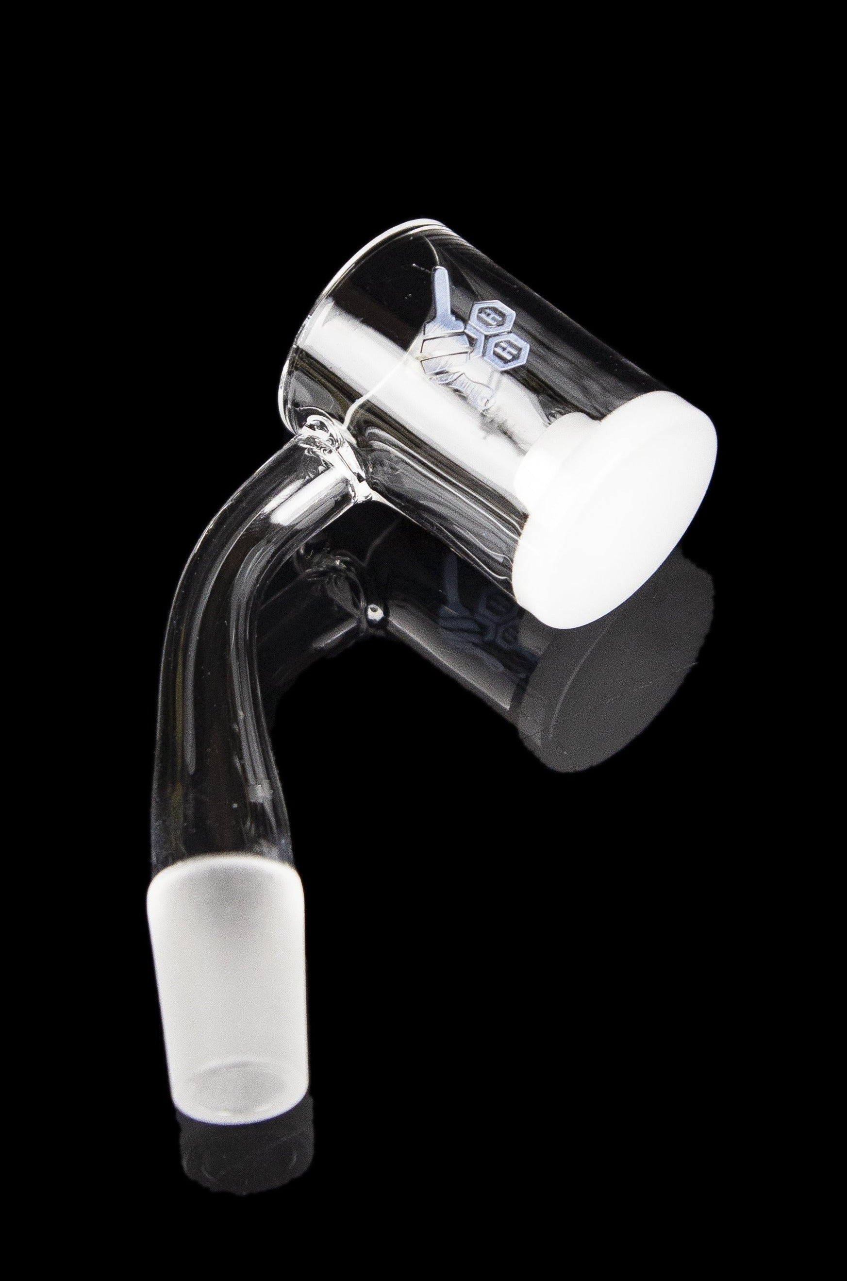 Clear glass dab rig with white accents, isolated on a black background.