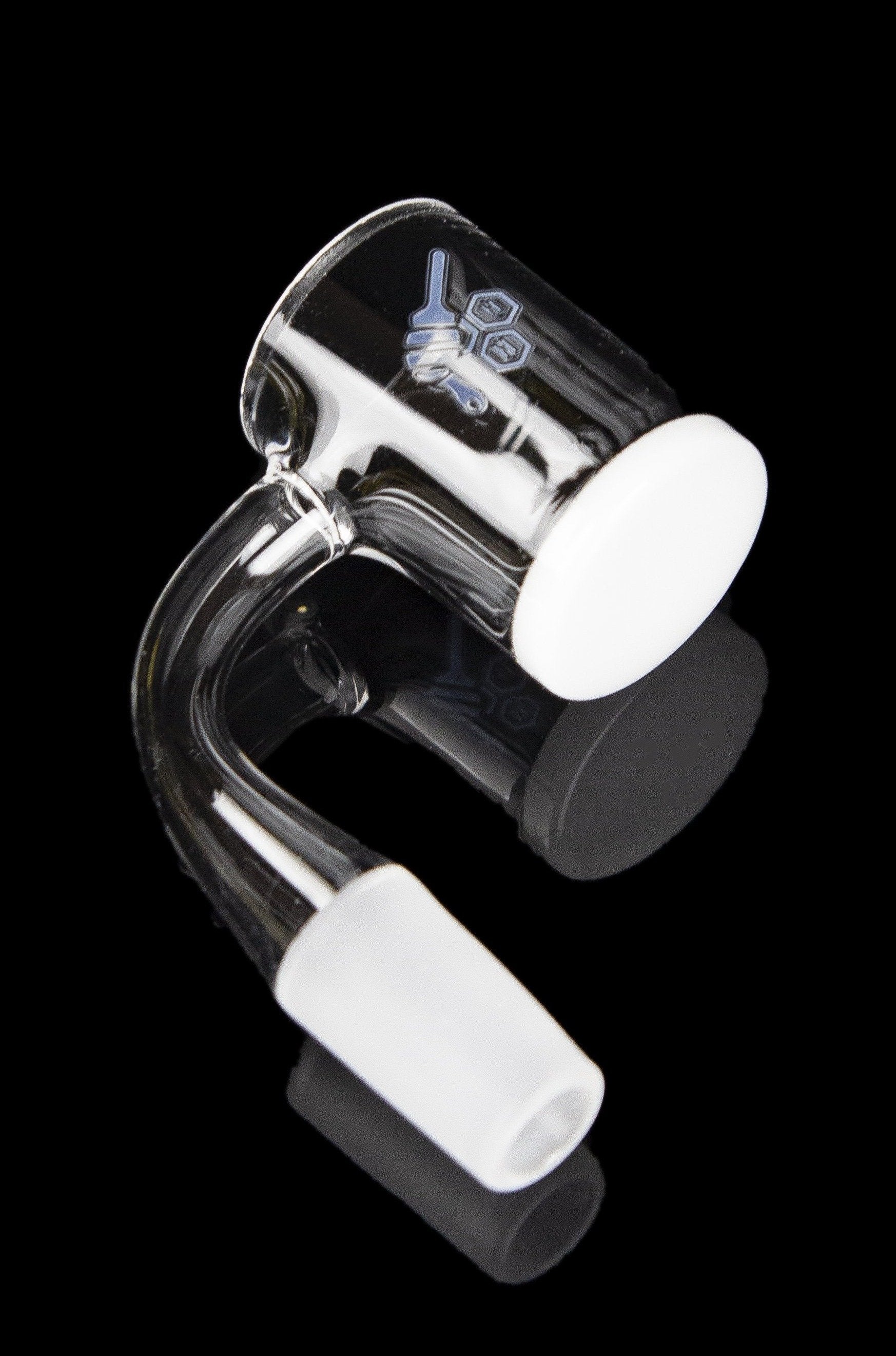 Clear glass dab rig with a bent neck and white accent pieces, isolated on a black background.