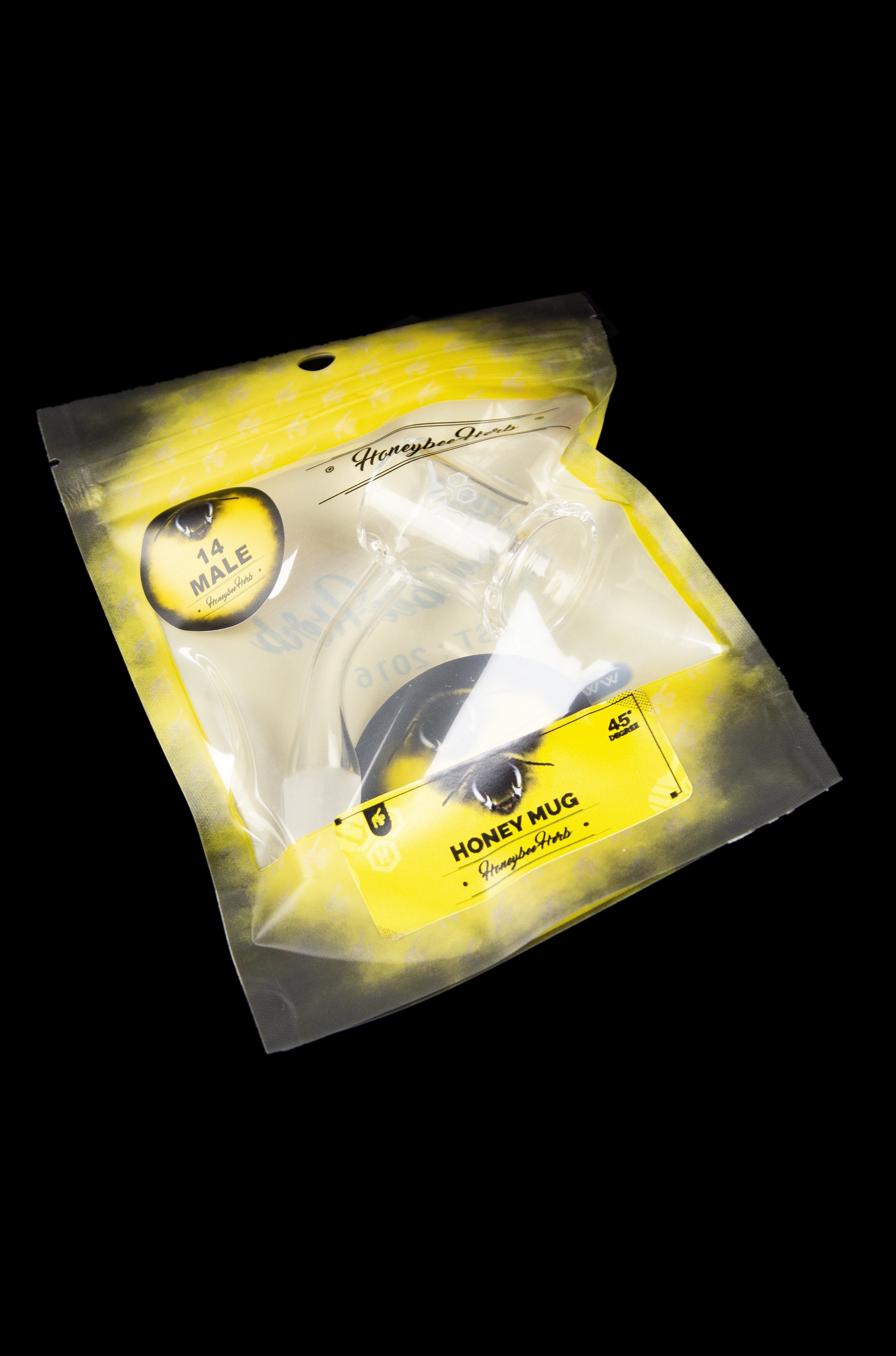 Yellow mylar bag labeled “Honey Mug” with a bee illustration, containing a cannabis smoking device.