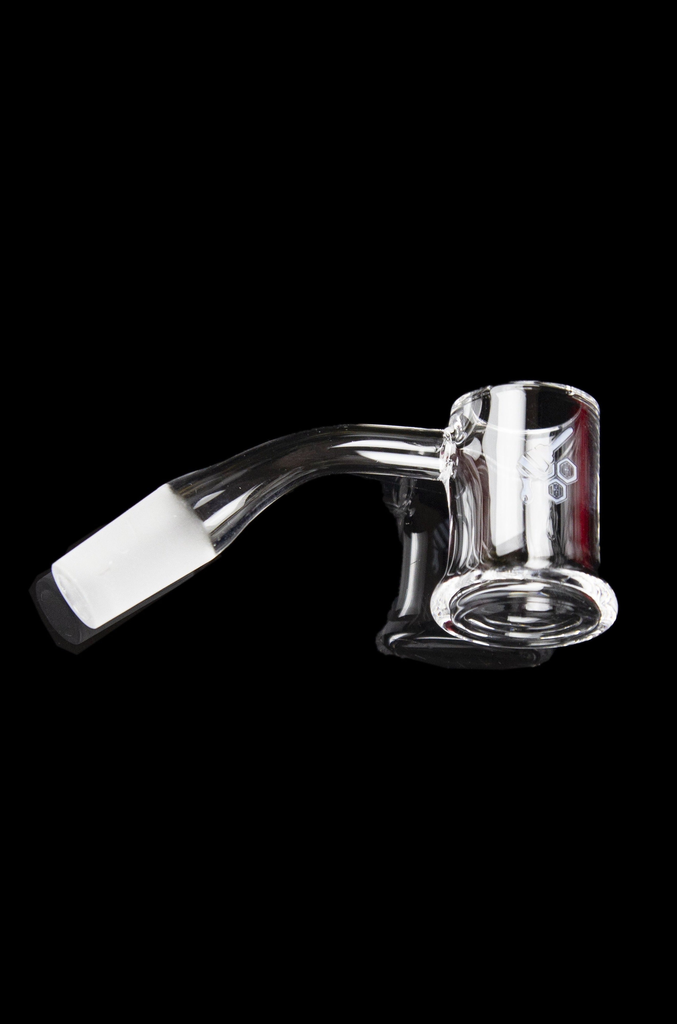 Clear glass dab rig with red and white accents, isolated on a black background.