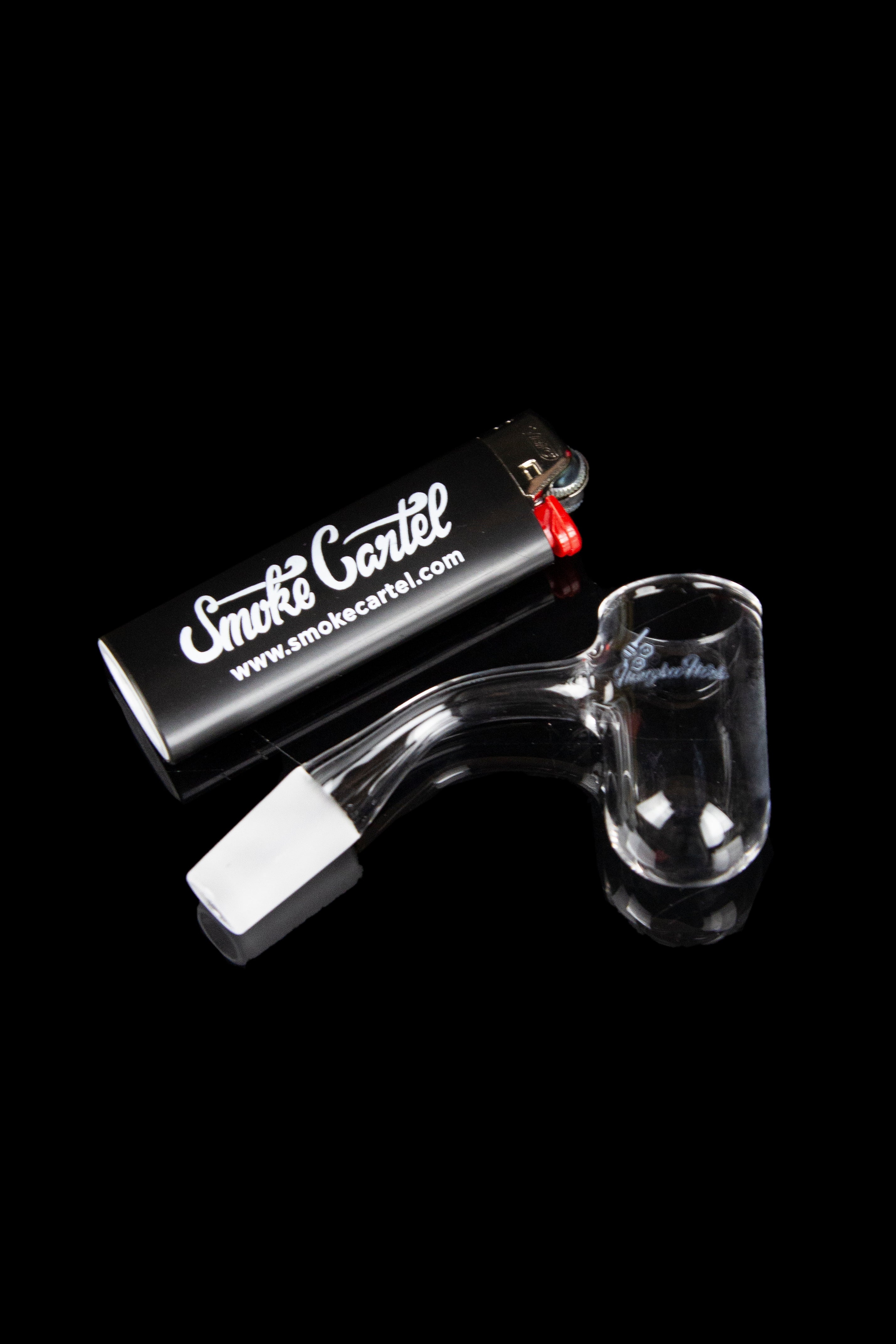 Glass oil rig with accessories on a black background.