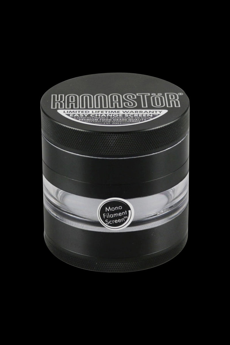 A close-up, angled view of the Kannastor 2.5" 4-Piece Grinder, showcasing its metallic finish and circular design.