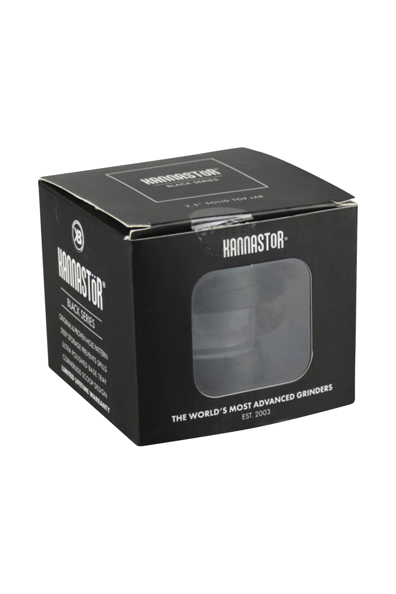 A close-up, angled view of the Kannastor 2.5" 4-Piece Grinder with Monofilament EZ Screen, showcasing its metallic finish and multi-part design.