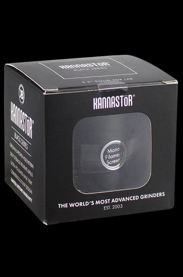 A close-up of the Kannastor Jar Body 4 Piece Grinder, displaying its dark, textured surface and branded logo.