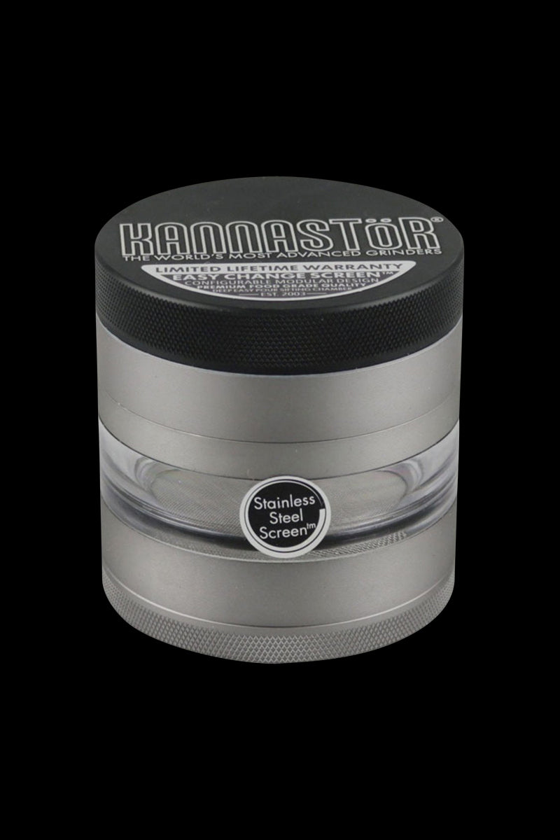 Close-up of the gunmetal Kannastor Multi Chamber Grinder, showcasing its multi-tiered design and metallic finish.