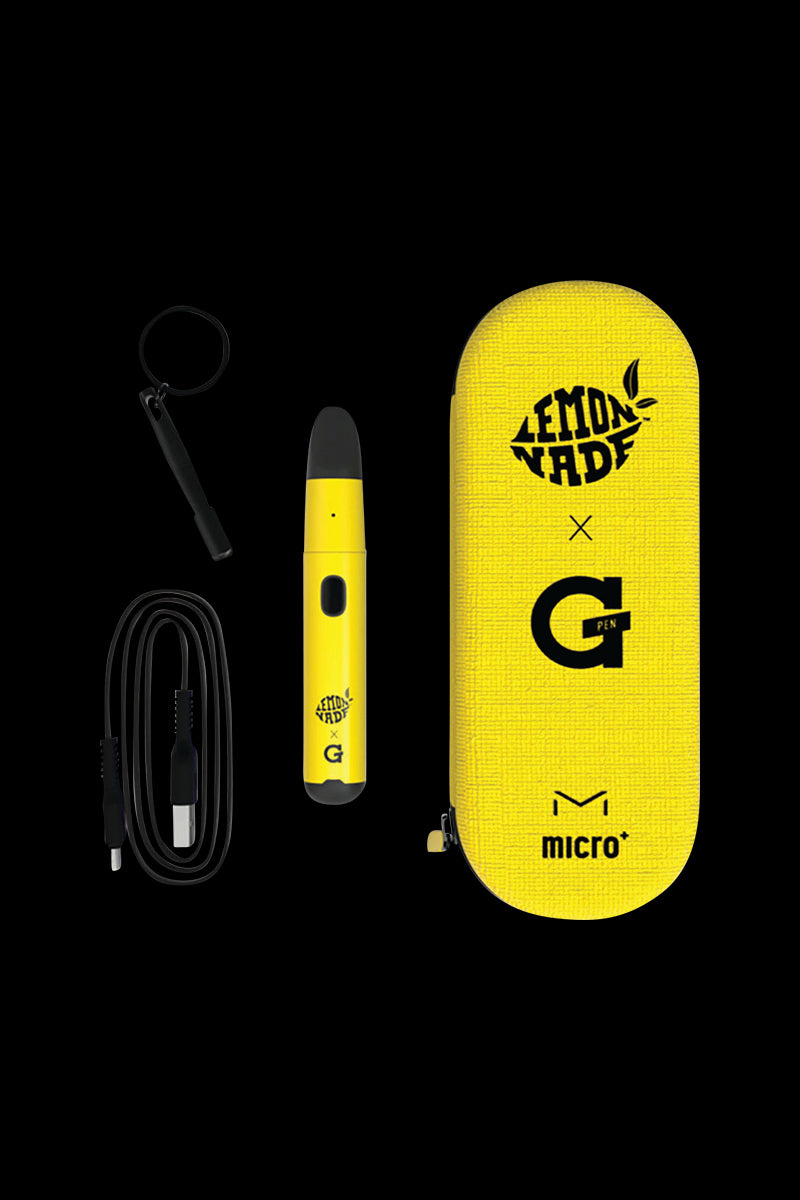 Front view of the Lemonnade x G Pen Micro+ Concentrate Vaporizer with a charging cable laid beside it on a black surface.