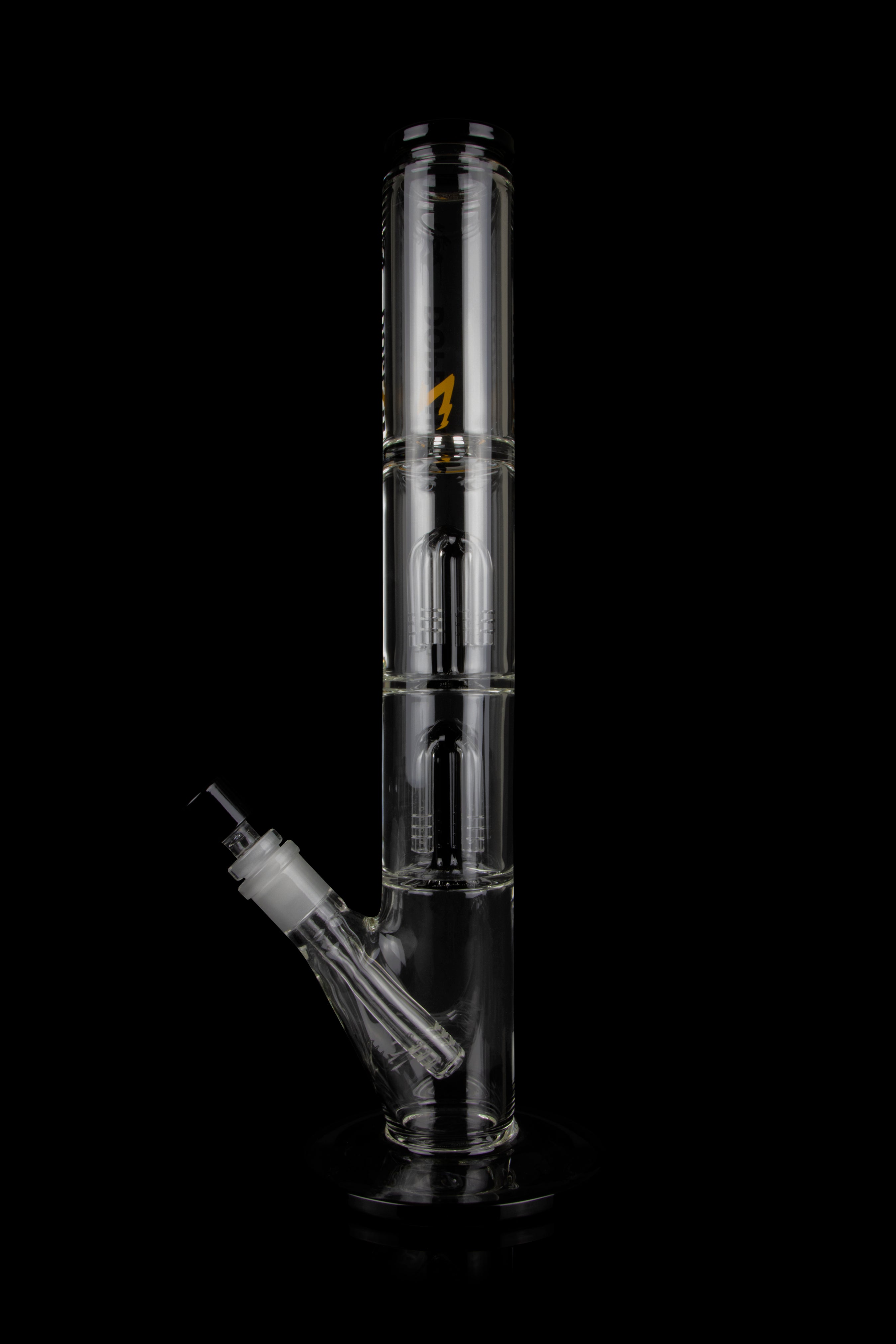 Glass water pipe (bong) with multiple chambers and a downstem, isolated on a black background.