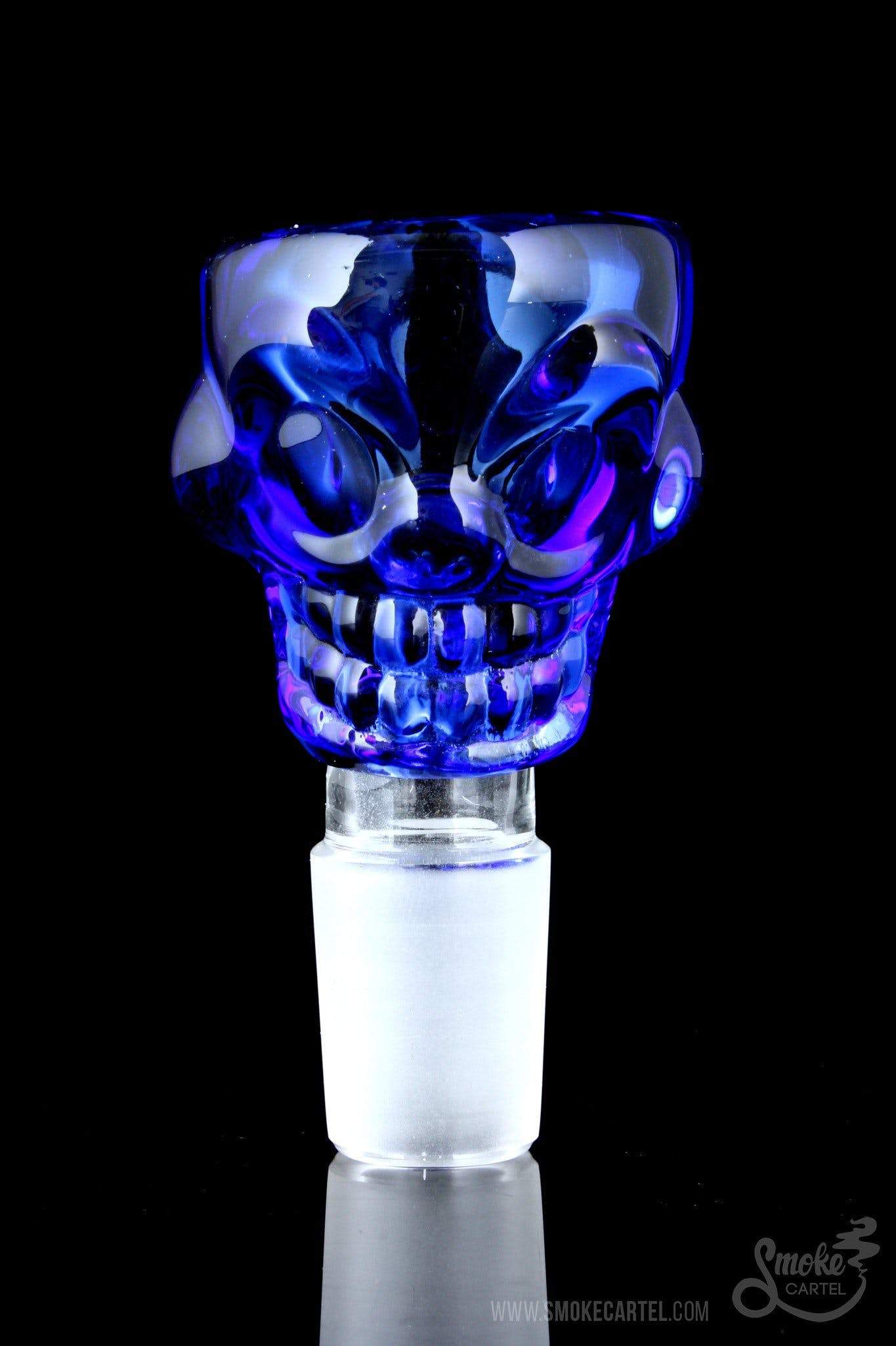 A detailed studio shot of the “The Skull” Bowl Slide, showcasing its sculpted glass design and clear construction.