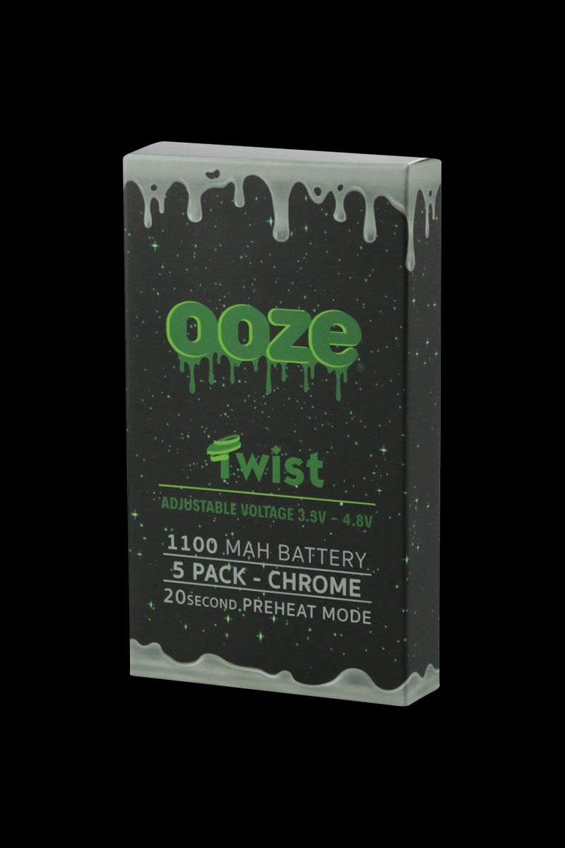 Three-quarter view of the black box packaging for Ooze Adjustable Twist 1100mAh Batteries - 5 Pack, showing green dripping logo and chrome text on a starry background