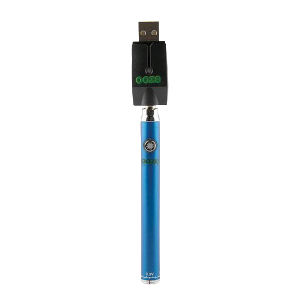 Straight-on view of the blue Ooze Slim Twist Battery with Charger standing vertically against a white background, the USB charger attached at top.