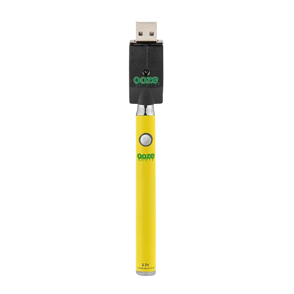 Centered vertical view of a yellow Ooze Slim Twist Battery with Charger standing against a white background, USB charger attached at the top.