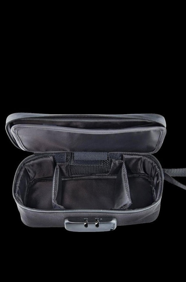 The open Ooze Smell Proof Travel Pouch is displayed with a black interior and organized compartments visible from a top-down perspective.