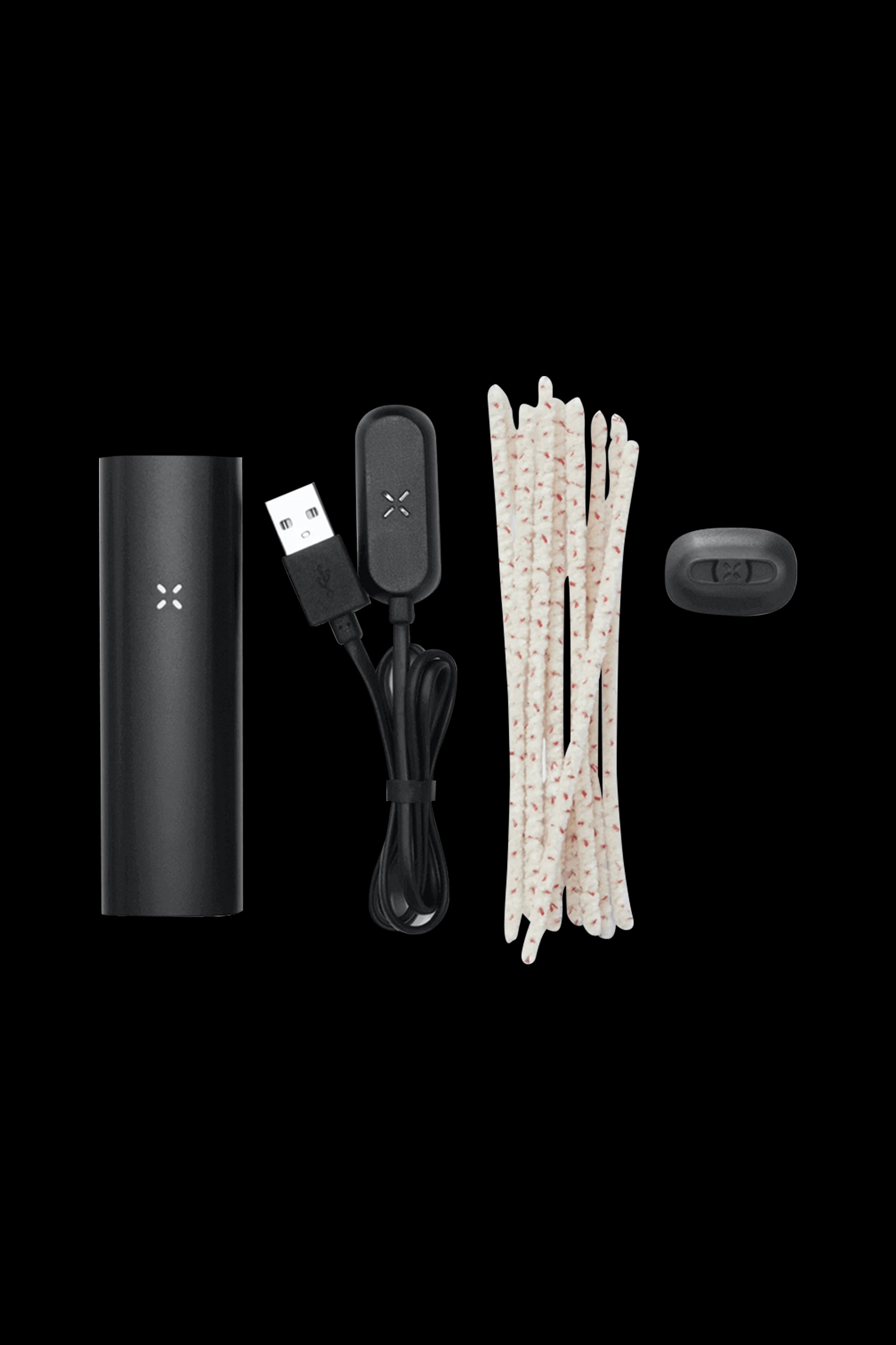 PAX Plus cannabis vaporizer with USB charger and replacement oven lids.