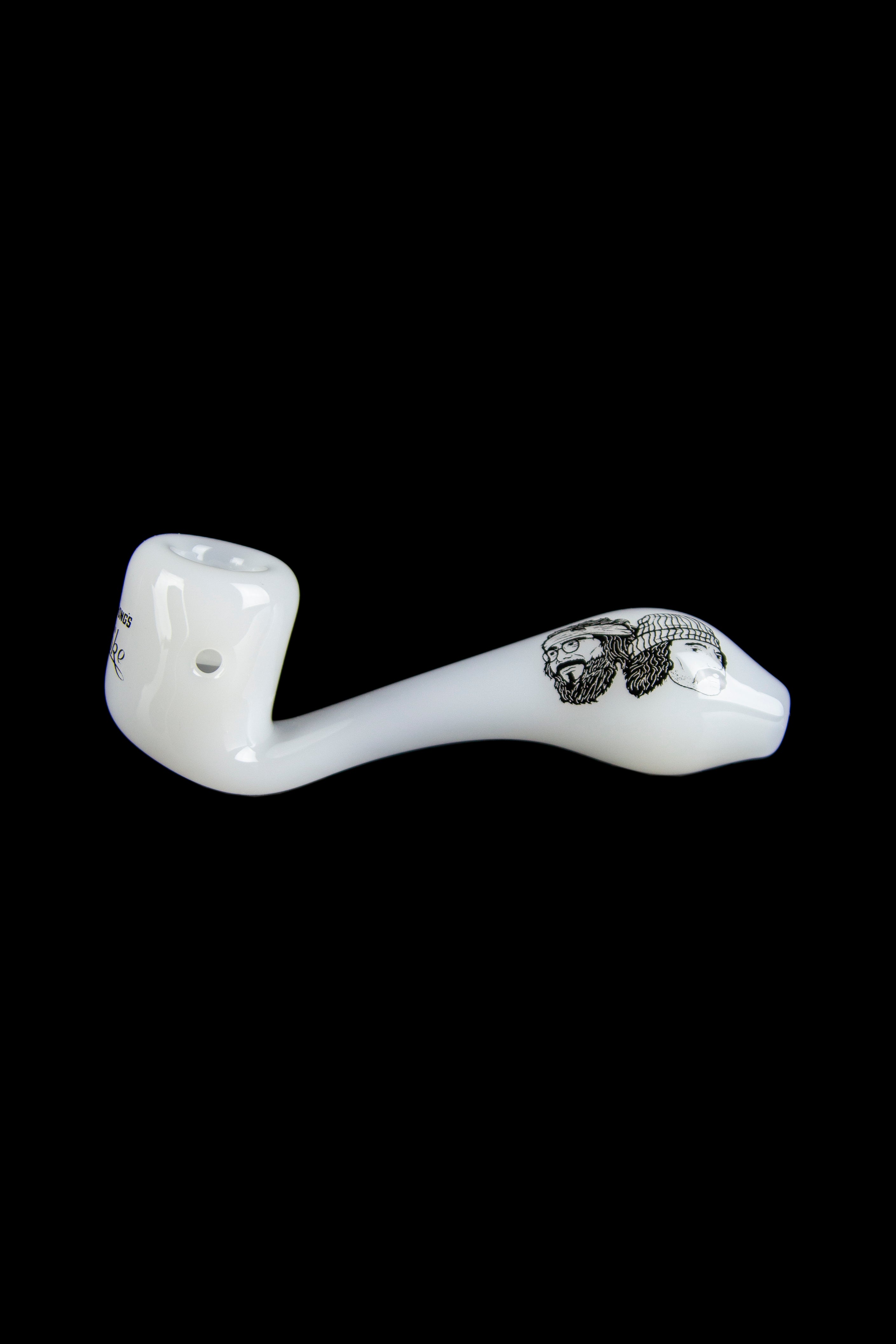 White glass pipe with a detailed skull illustration.