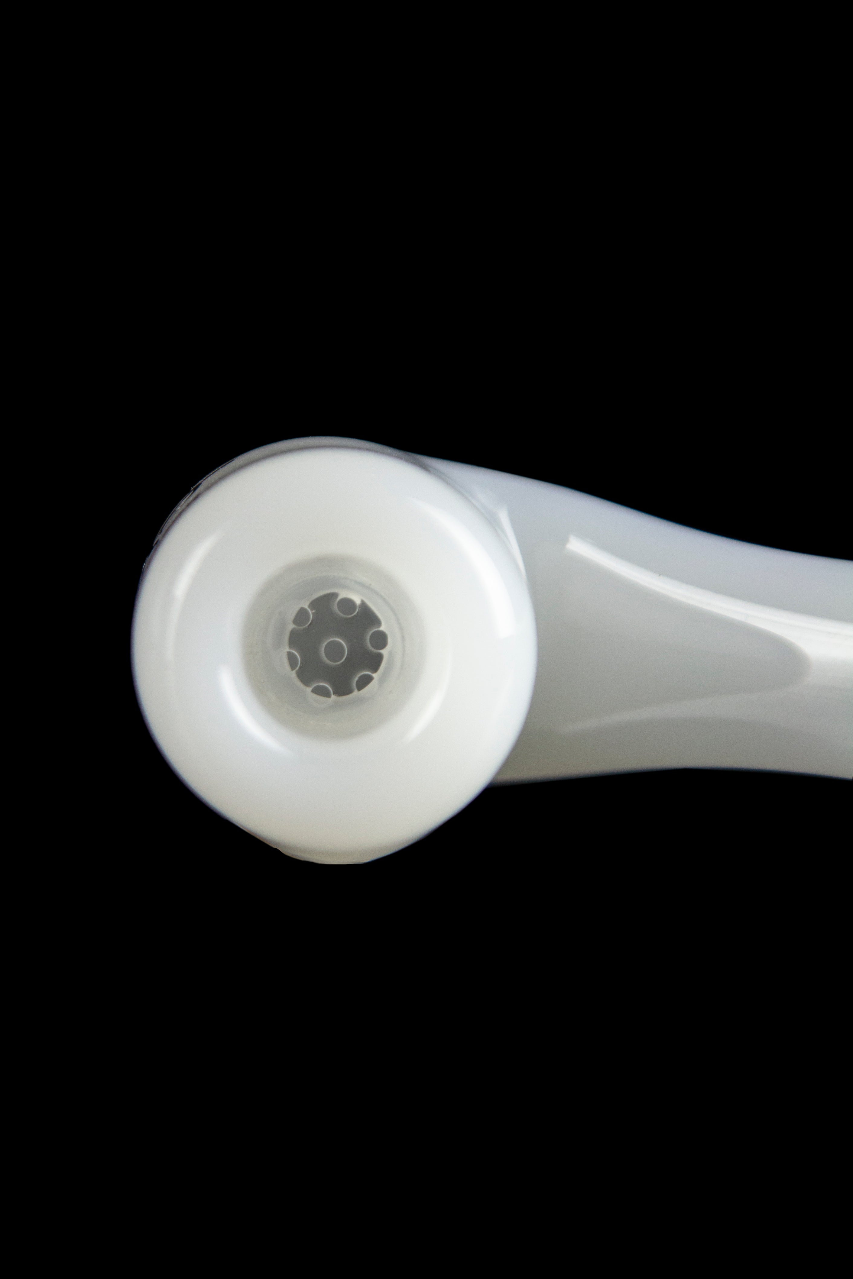Frosted glass pipe with diffuser downstem, isolated on black.