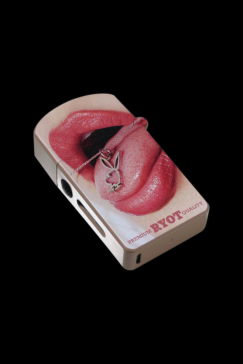 Angled close-up of a Playboy x RYOT Verb Vaporizer showing a glossy red-lip print with a pendant on the tongue and "RYOT" text on the lower corner