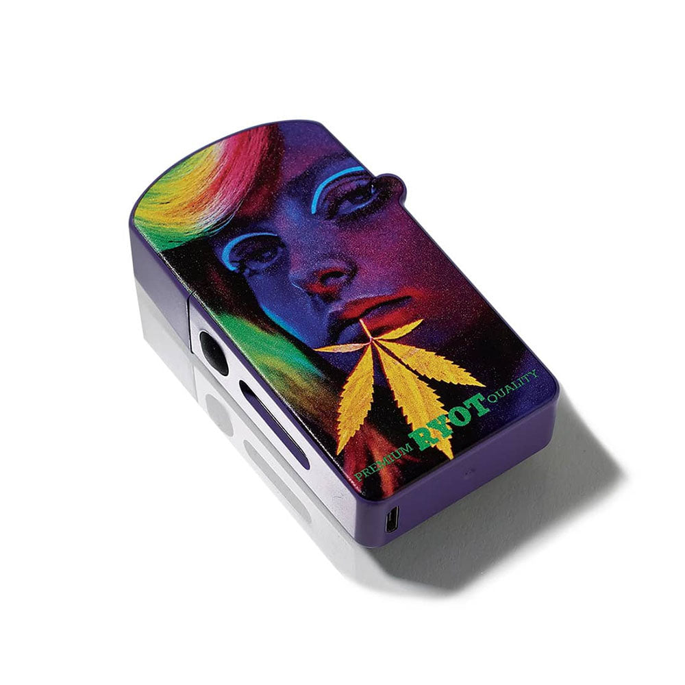 Angled top-down view of the Playboy x RYOT Verb Vaporizer showing a colorful pop-art face and a yellow leaf graphic on purple.