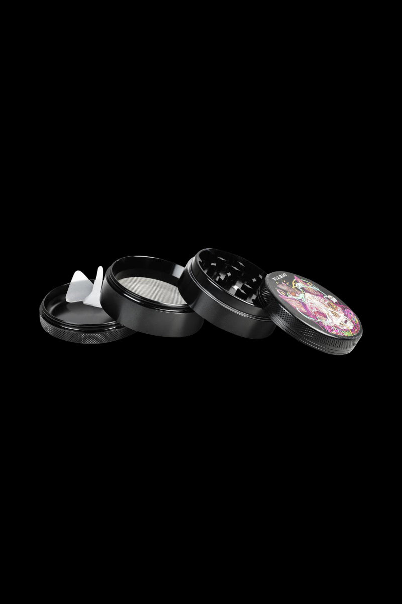 The Pulsar Artist Series 4-Piece Metal Grinder - MrOw is shown open, displaying its four metal pieces in a top-down angled view.