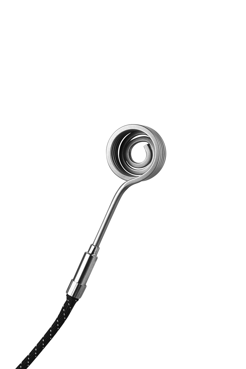 Top-down close-up of the Pulsar Axial Mini eNail Kit's coiled stainless steel heating element and angled wand against a white background