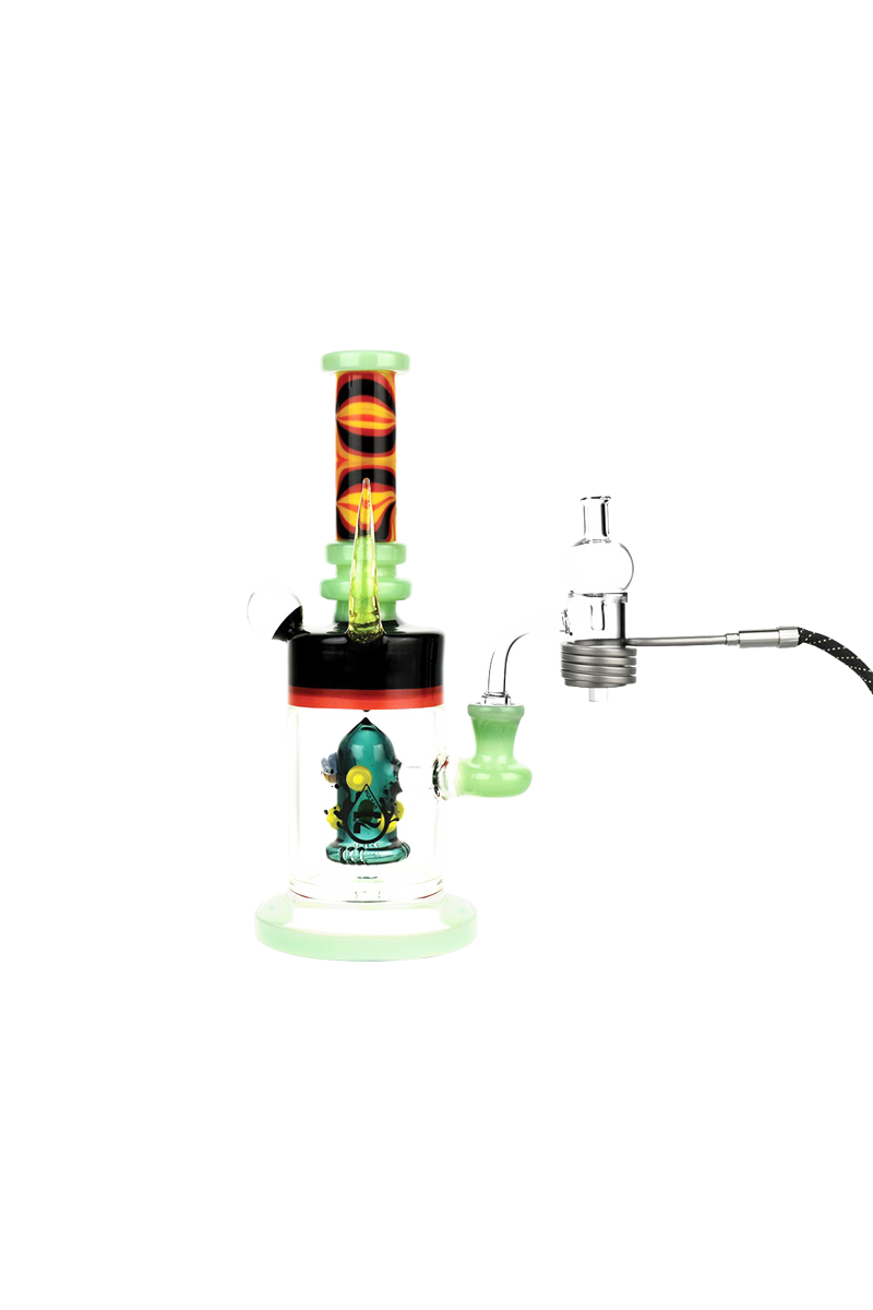 Front view of a colorful glass setup with a neon green base and patterned tube, the Pulsar Axial Mini eNail Kit shown with its clear water chamber and attached quartz e-nail.