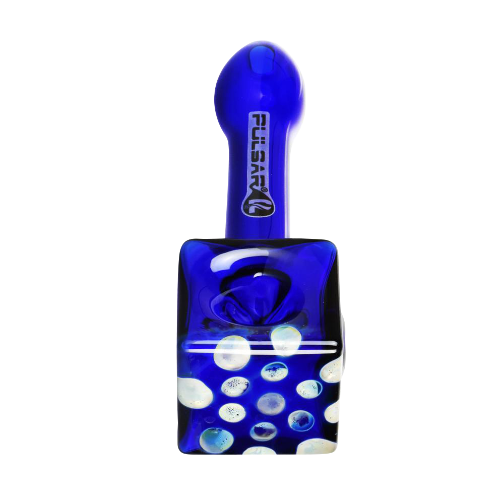 A close-up shows the Pulsar Cube Universe Spoon Pipe in blue glass, with a speckled pattern resembling stars.