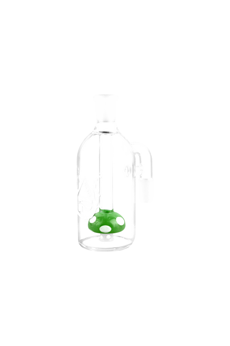Center view of a clear Pulsar Mushroom Perc Ash Catcher showing a small green mushroom perc with white spots inside the glass chamber.