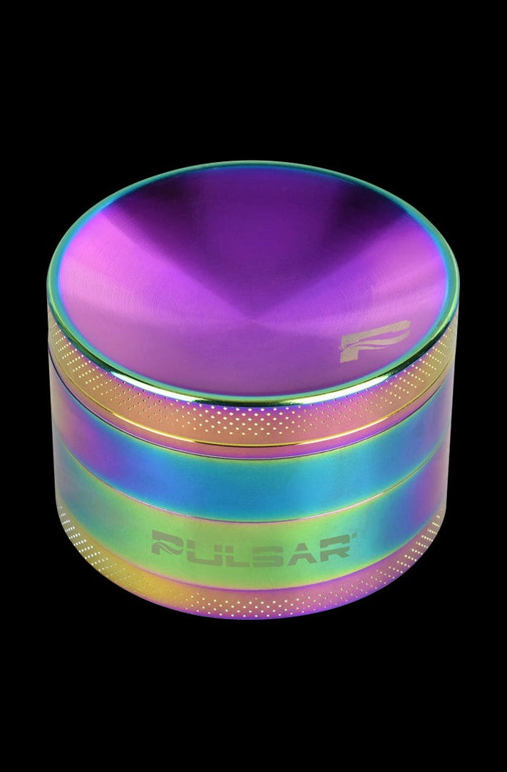 A close-up of the Pulsar Concave Rainbow Anodized Aluminum Grinder, showcasing its colorful, multi-tiered design.