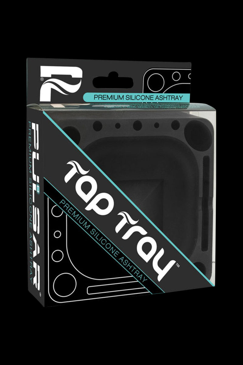 Front-facing boxed view of the Pulsar Tap Tray in black silicone visible through clear packaging with teal accents and diagonal branding.
