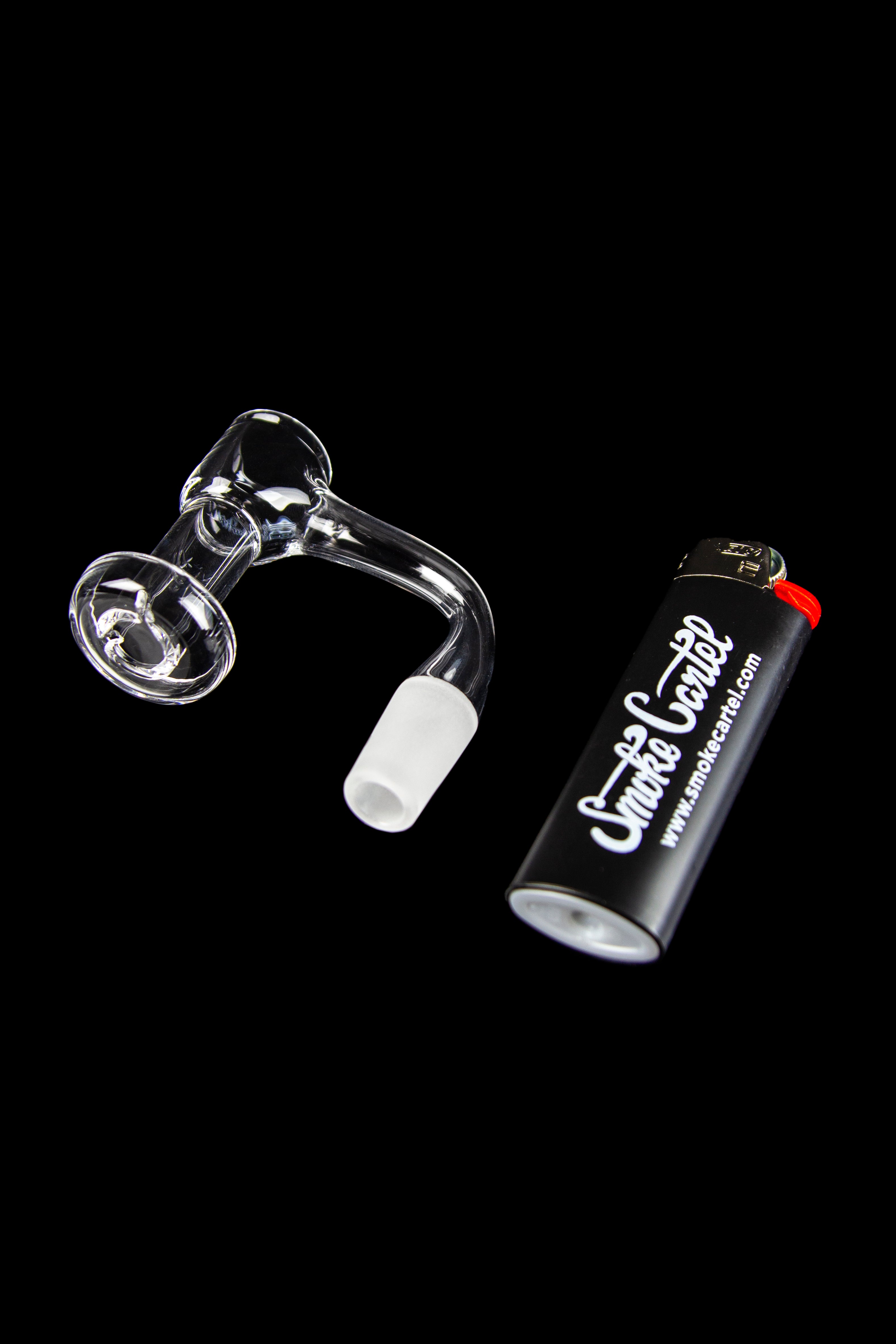 Quartz dab rig with a branded lighter on a black background.