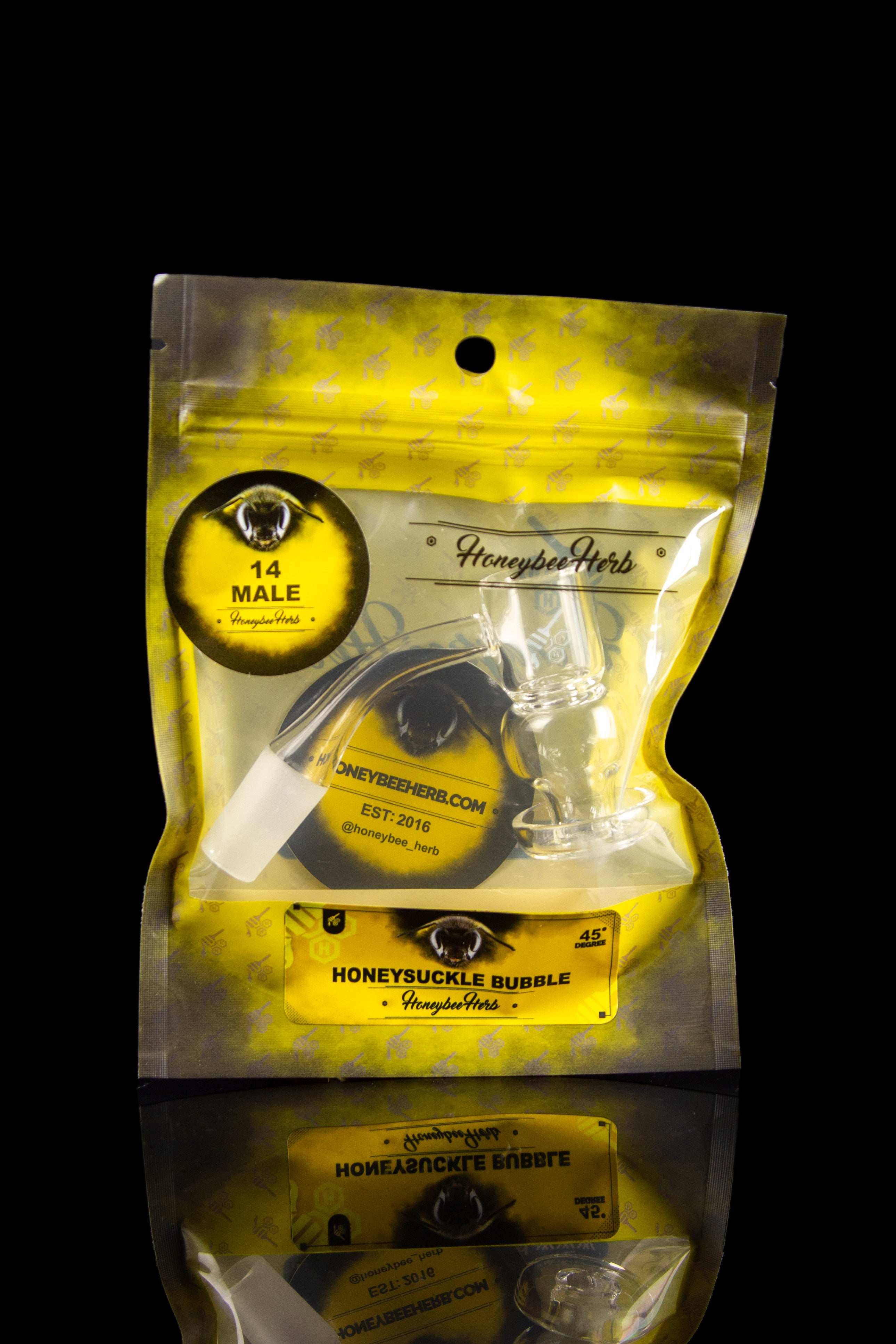 Gold mylar bag of “Honeysuckle Bubble” cannabis concentrate by Honeybee Herb, featuring a black bee illustration and branding details.