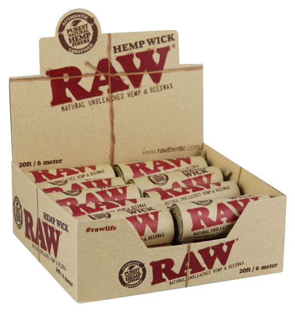 A close-up, slightly angled shot of a package of RAW Natural Hemp Wick Rolls, displaying the branded packaging and stacked rolls.