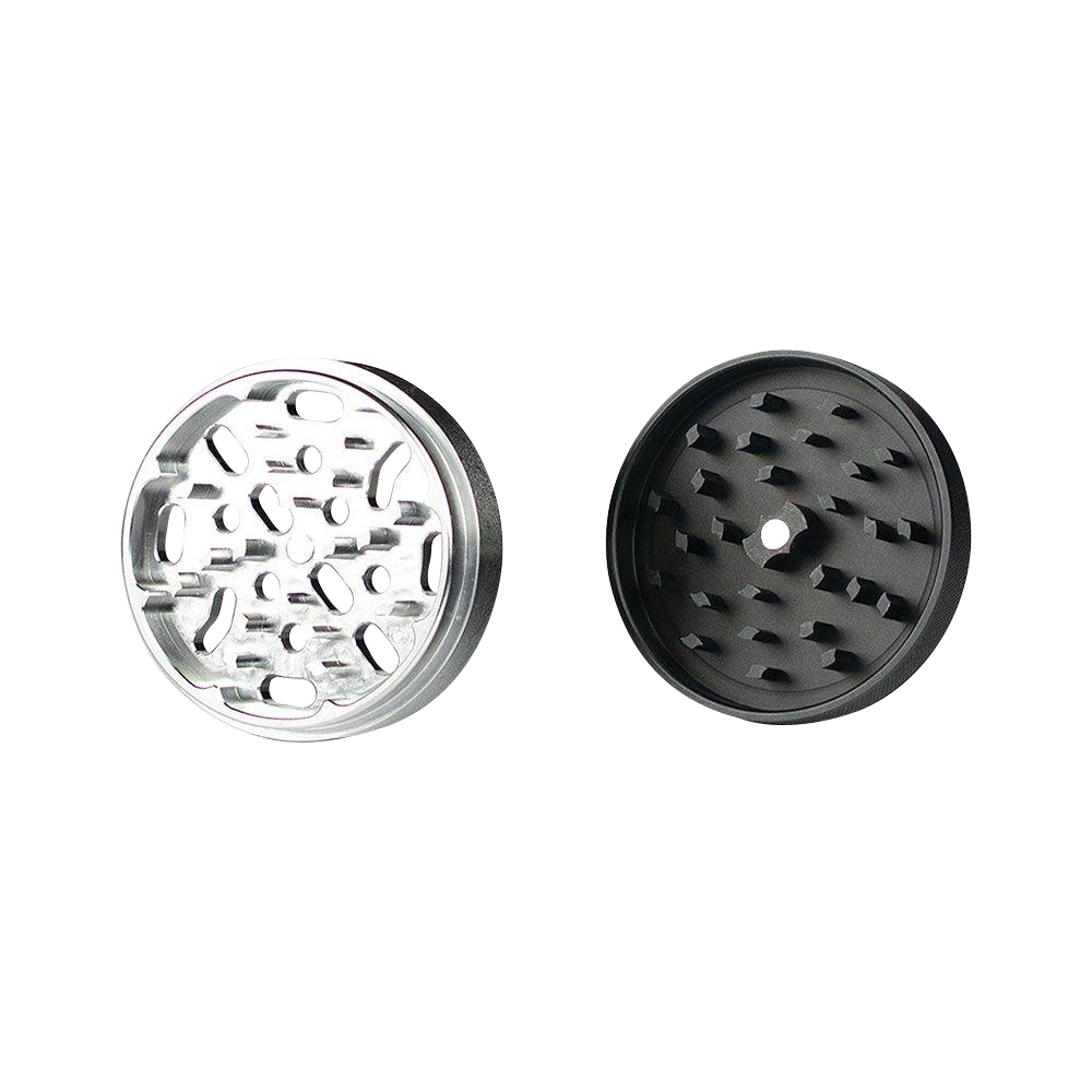 Close-up of the Kannastor 4-Piece Solid Body Grinder, showcasing its four-part metallic construction in a circular arrangement.