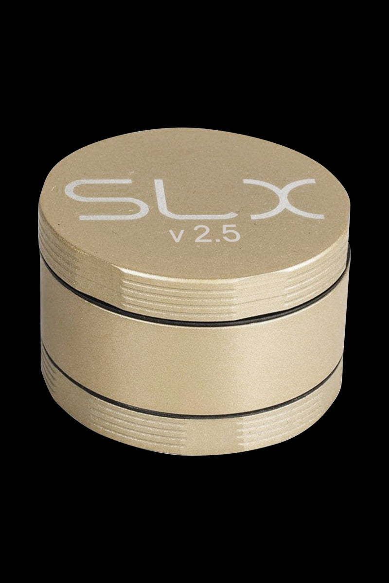 A close-up view of the SLX Ceramic Coated 2.5" Medium Grinder, showcasing its metallic finish and cylindrical shape.