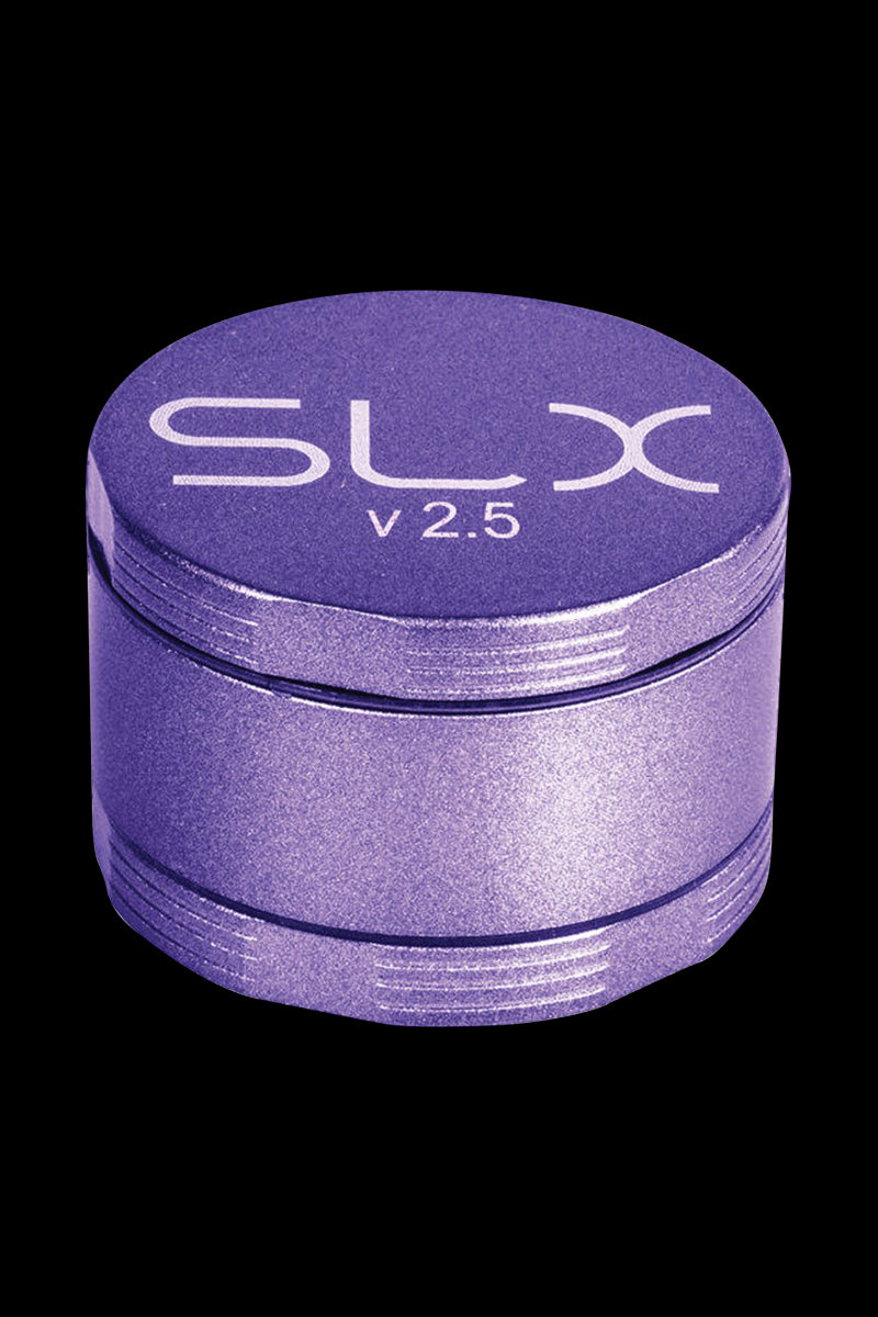 A close-up of the SLX Ceramic Coated 2.5" Medium Grinder, showcasing its metallic finish and cylindrical shape.
