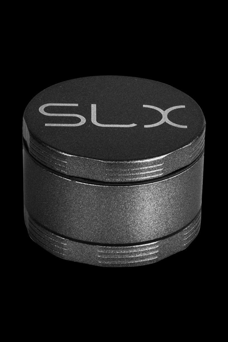 Close-up front view of the black SLX Ceramic Coated 2.2" Pocket Grinder showing its textured cylindrical body and engraved SLX lid.