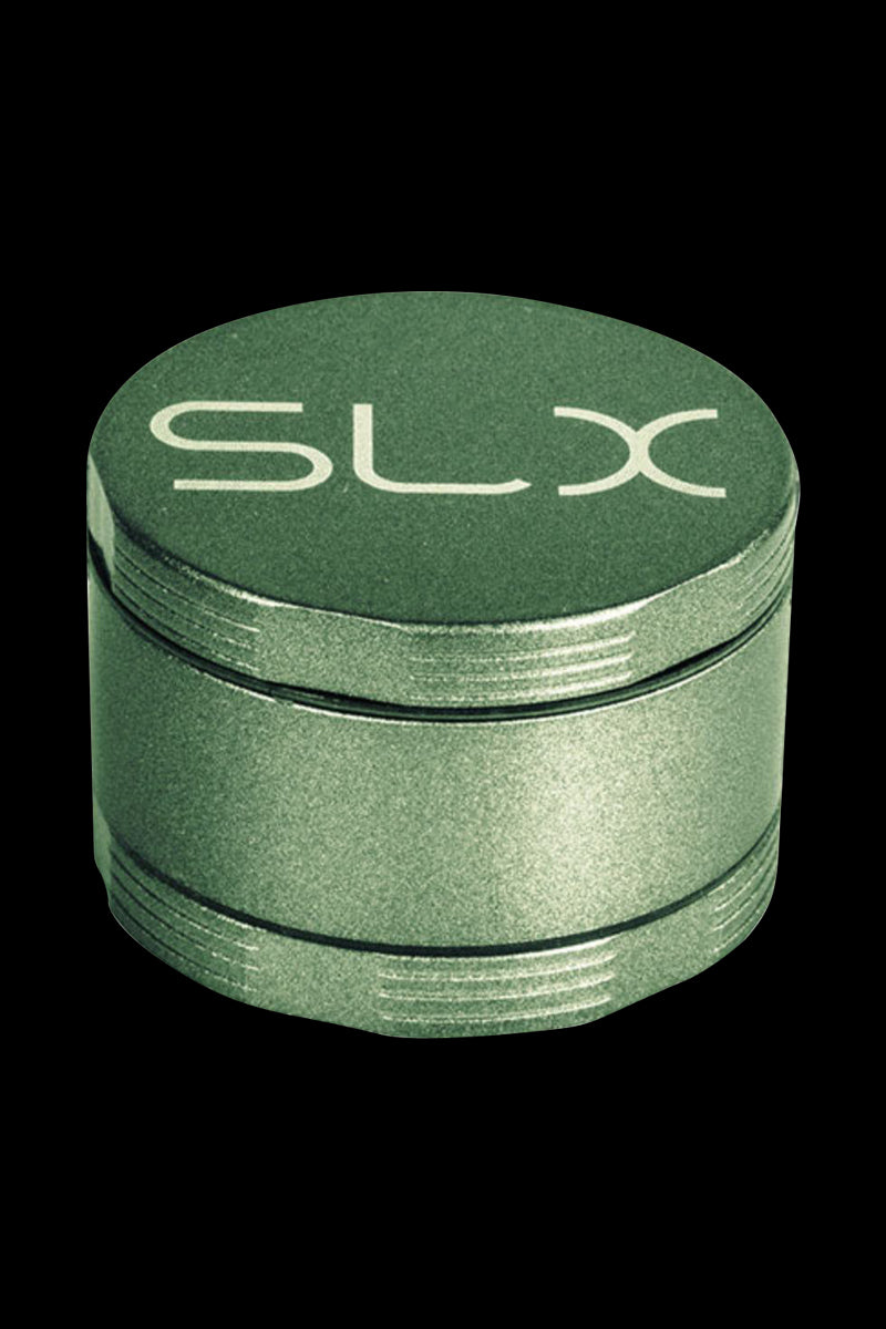 Top-down angled view of the green SLX Ceramic Coated 2.2" Pocket Grinder showing its textured lid with large SLX logo and threaded metal sides