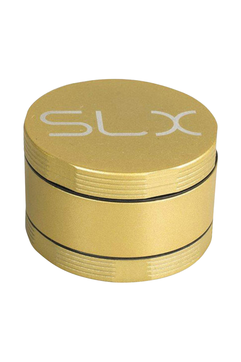 Close-up front angle of the gold SLX Ceramic Coated 2.2" Pocket Grinder showing its stacked, three-piece body and white SLX logo on the lid.