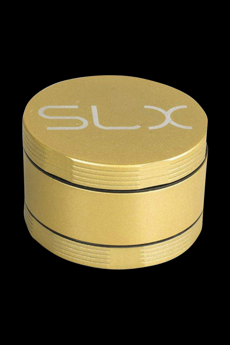 Close-up front view of the silver SLX Ceramic Coated 2.2" Pocket Grinder showing its round, textured lid with the SLX logo against a black background.