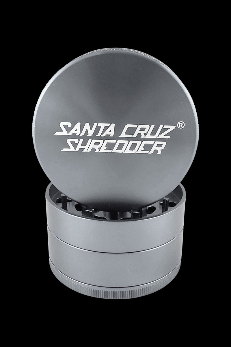 A close-up, angled view of the Santa Cruz Shredder Grinder - Large, showcasing its metallic, tiered construction.