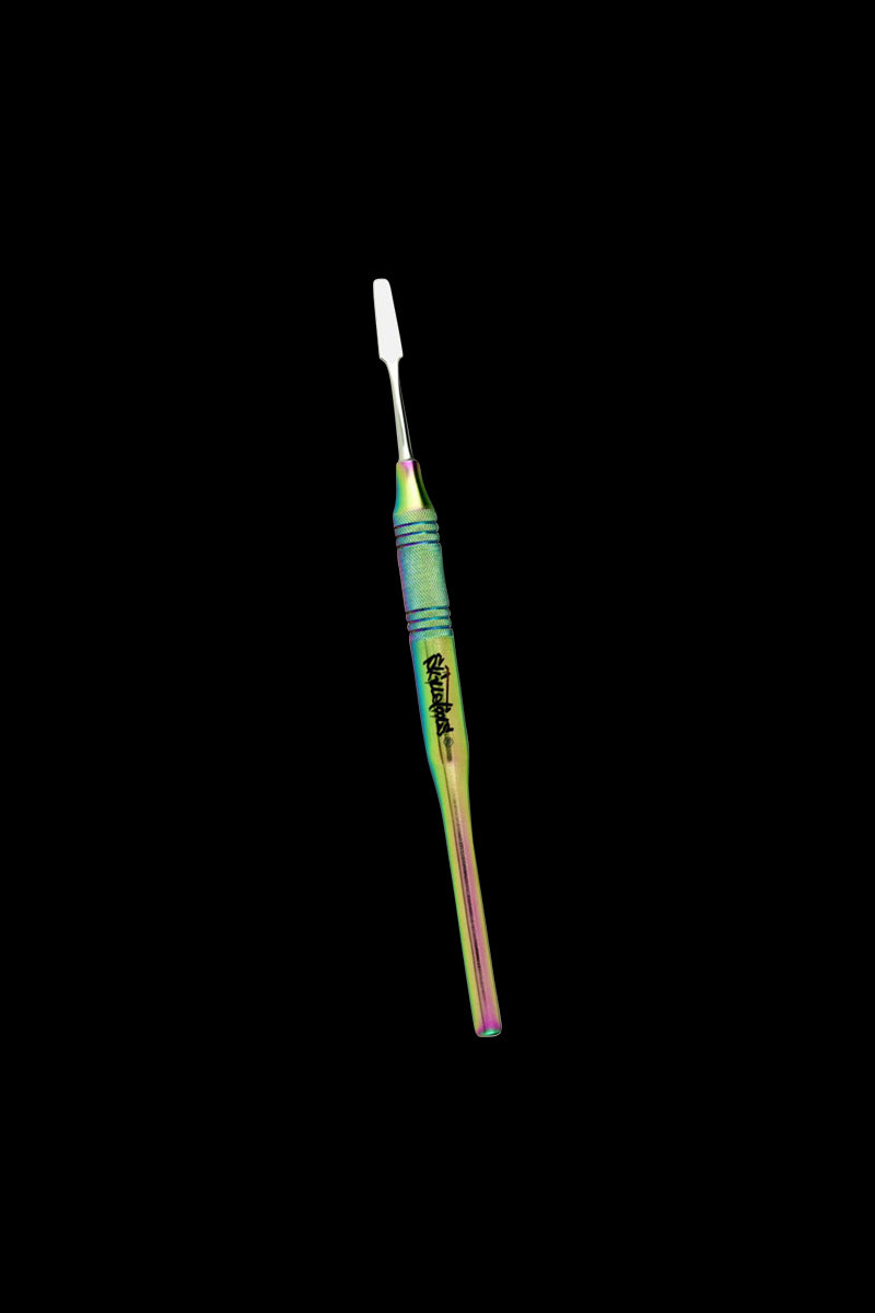 Angled close-up of a rainbow-anodized Skilletools Anodized Series Dab Tools against a black background, showing its textured grip.