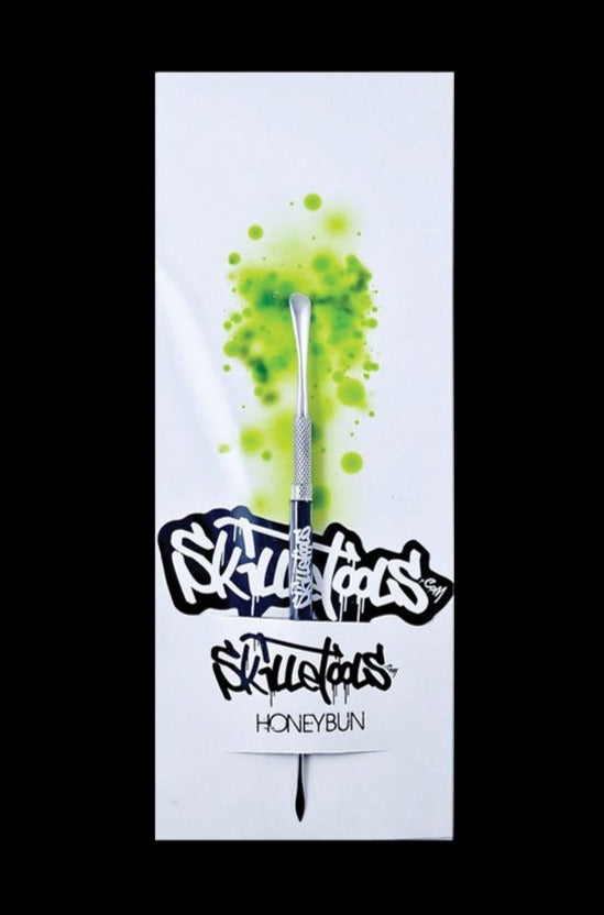 Front view of the Skilletools Classic Series Metal Dab Tools with a white background and a modern, artistic design.