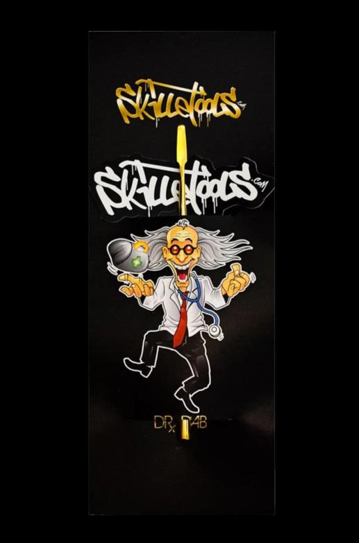 A detailed illustration featuring the Skilletools Gold Series Dab Tools, showing a character in a lab coat holding a tool.