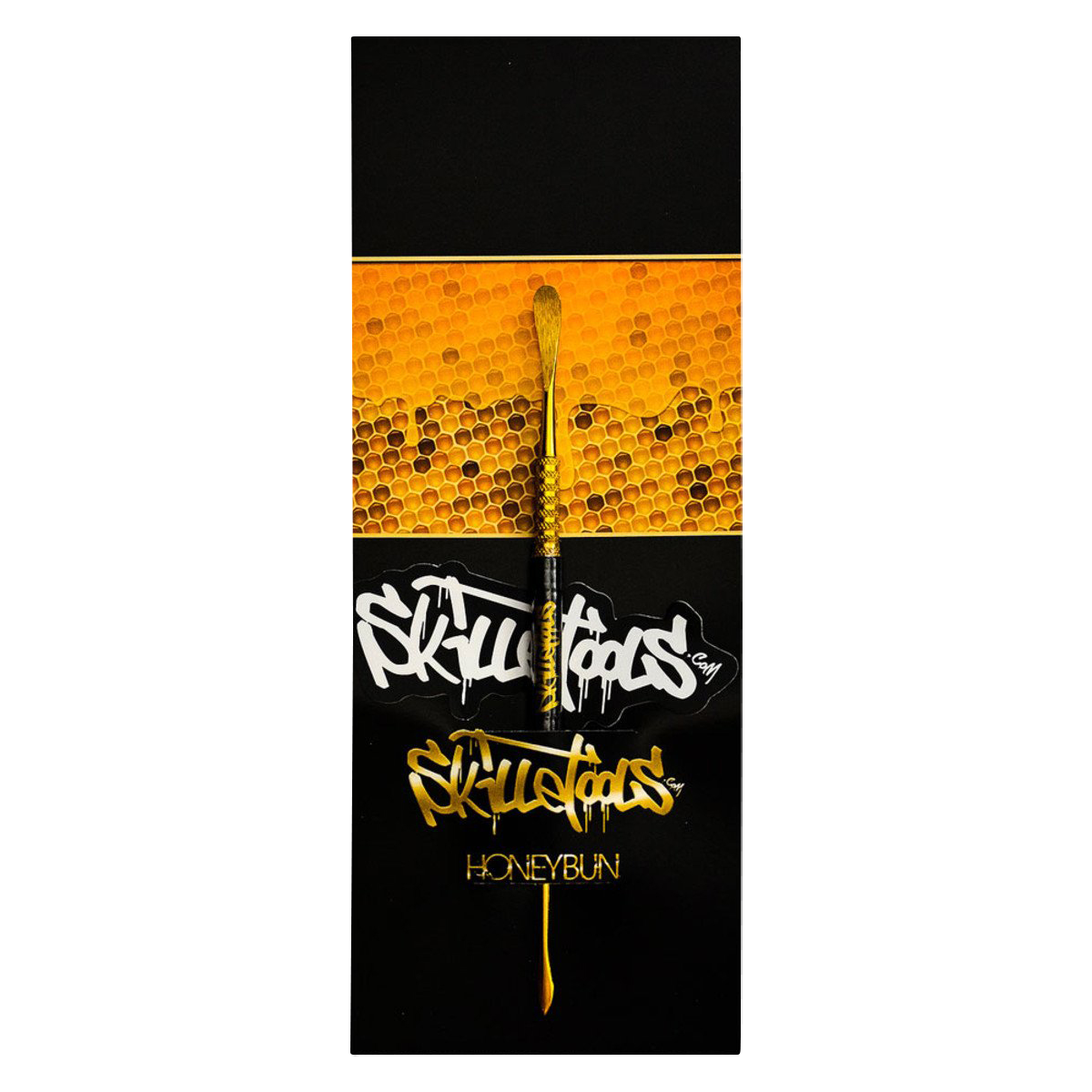 A close-up shot of the Skilletools Gold Series Dab Tools against a textured gold background.