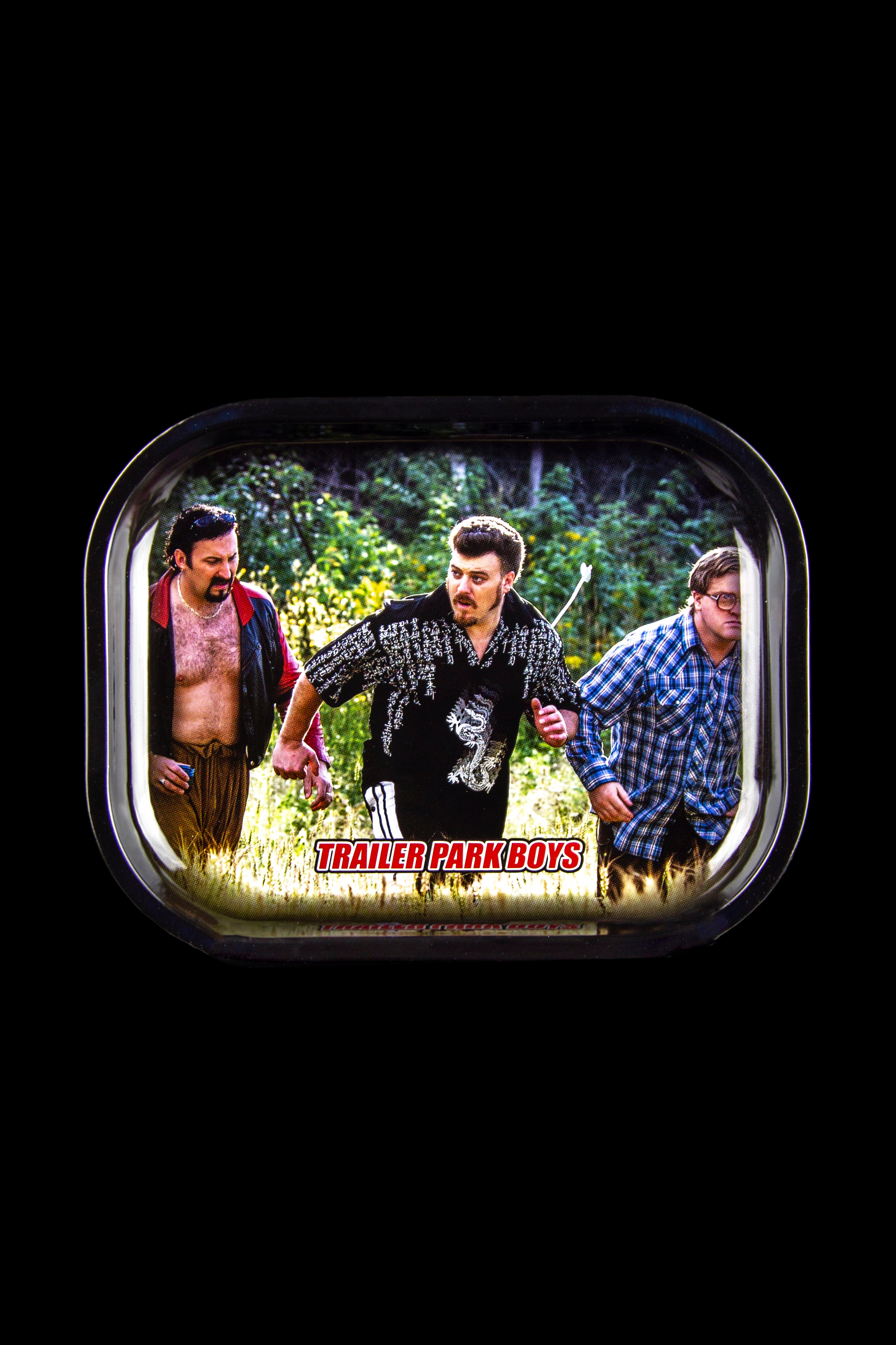 Metal rolling tray featuring Ricky, Julian, and Bubbles from *Trailer Park Boys* running through a field, with the show's logo overlaid on the grass.