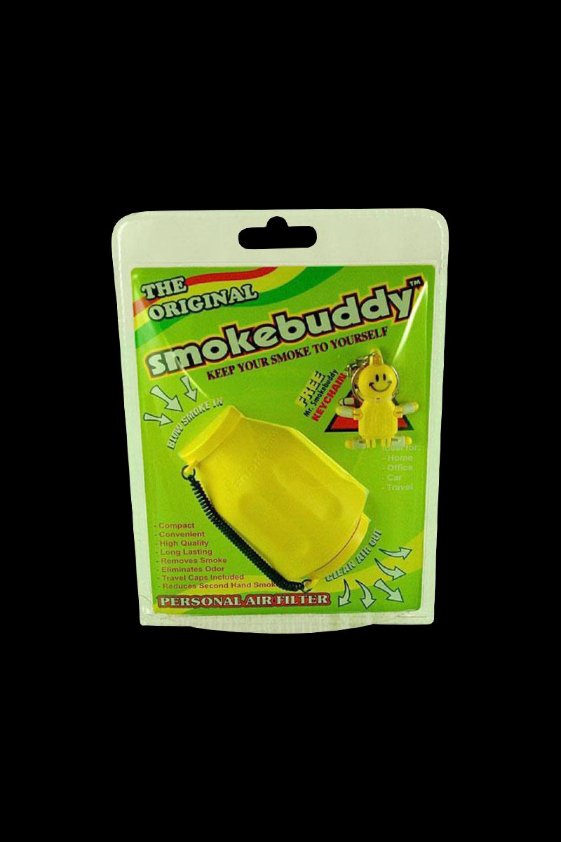 Front-facing shot of the Grenade-colored Smokebuddy Original Personal Air Filter in its green blister-packaging against a black background.