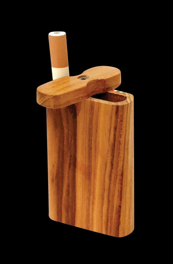 Front view of the Solid Light Wood Dugout, displaying a partially smoked cigarette in its open slot on a dark background.