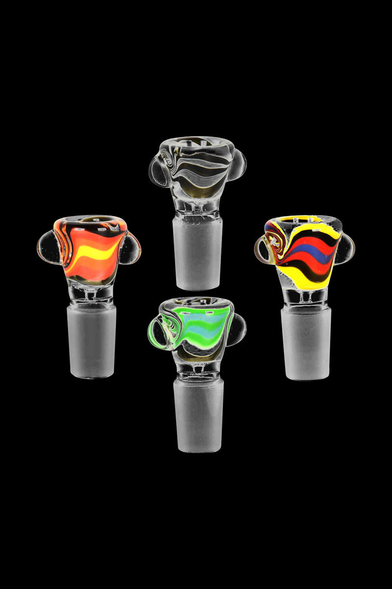 A close-up, angled view of the Sunrise Swirl Glass Bowl, showcasing its colorful swirl pattern and clear glass construction.